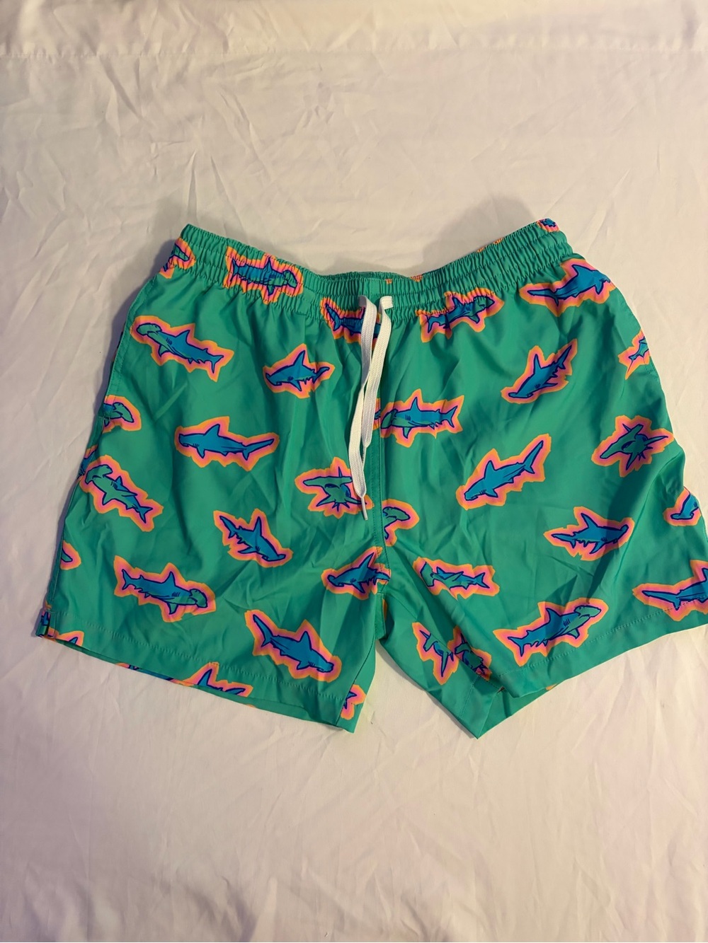 chubbies Teal Swim Trunks with Blue & Pink Shark Motif